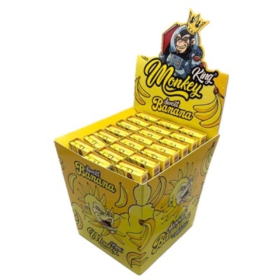Caixa amarela com pacotes amarelos de King Monkey Sweet Banana e ilustrações de bananas