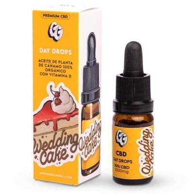 Frasco de óleo CBD Wedding Cake e sua embalagem amarela com ilustração de bolo