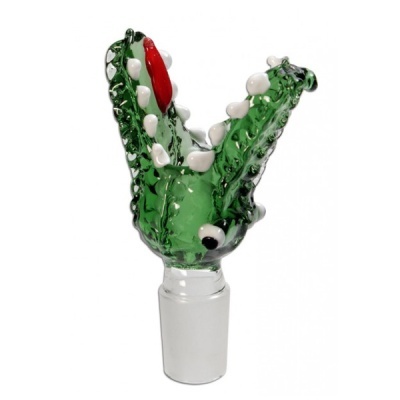 Acessório de vidro verde em forma de planta carnívora com dentes, olho e detalhe vermelho