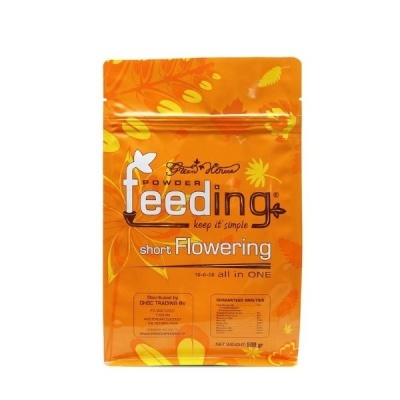 Embalagem laranja de fertilizante em pó feeding short Flowering com texto e gráficos amarelos.