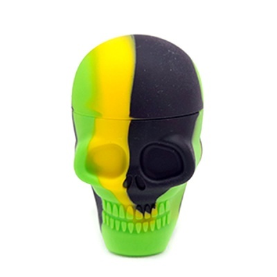 Recipiente em forma de caveira tricolor verde, amarelo e preto
