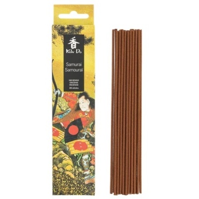 Caixa amarela e preta de incenso Samurai com 10 varetas marrons ao lado.