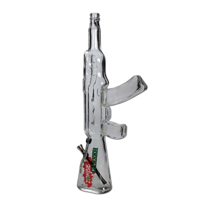 Objeto de vidro em forma de rifle com texto ZOMBIE WALKER