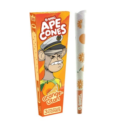Embalagem laranja com desenho de macaco e cone branco decorado com laranjas