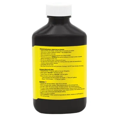 Frasco preto com tampa branca e rótulo amarelo com texto