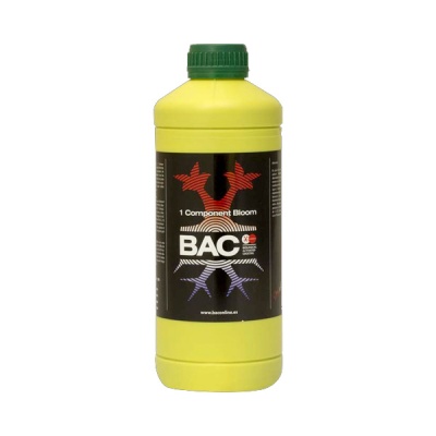 Frasco amarelo com tampa verde e etiqueta preta com texto e padrão colorido
