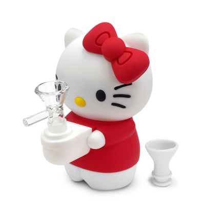 Figura de gato branco com laço vermelho segurando objeto com parte transparente