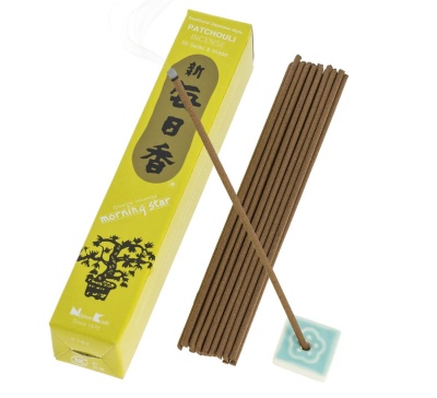 Caixa amarela de incenso Patchouli Morning Star com varetas marrons e suporte cerâmico azul
