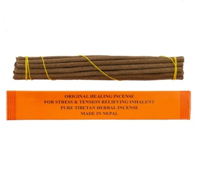 Incenso tibetano herbal com varetas e embalagem laranja