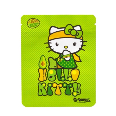 Embalagem verde com personagem Hello Kitty e texto em amarelo e verde