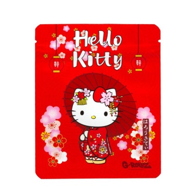 Pacote vermelho com Hello Kitty em quimono e guarda-chuva vermelho decorado com flores.