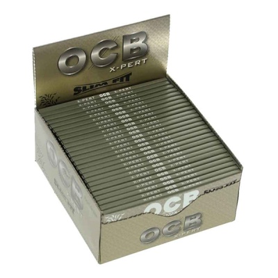 Caixa de papel para enrolar tabaco OCB X-Pert Slim Fit, bege com texto prateado e dourado.