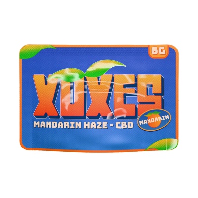 Embalagem azul com texto laranja XUXES e selo mandarin 6G