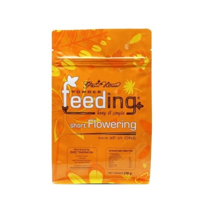 Embalagem laranja de fertilizante em pó feeding short Flowering com texto e gráficos amarelos.