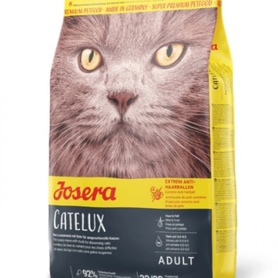 Saco amarelo e cinzento de ração para gatos Josera Catelux com imagem de um gato cinzento