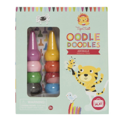 Brinquedo empilhável colorido 'Oodle Doodles Animals' numa caixa azul claro com desenhos de animais e texto