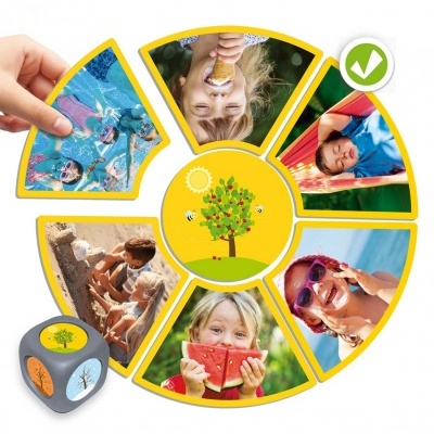 Jogo infantil de peças coloridas com fotos de crianças e dado com imagens de árvores