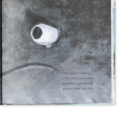 Página de livro ilustrada com baleia cinzenta e texto em português
