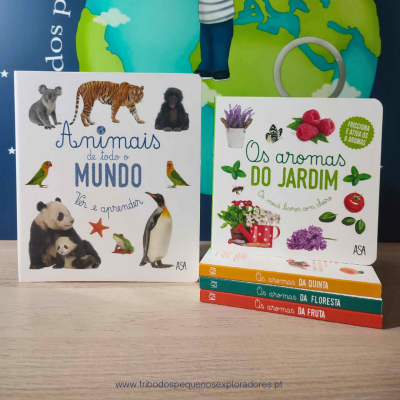 Livros infantis sobre animais e aromas com ilustrações e selo em mesa de madeira clara