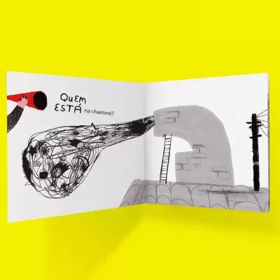 Livro ilustrado aberto com texto 'Quem ESTÁ na chaminé?', chaminé e estrutura artística em cinza e preto