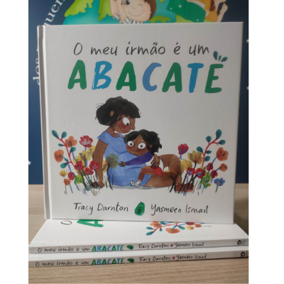 Capa de livro infantil com crianças e flores, título O meu irmão é um ABACATE.