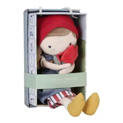 Boneca de pano vestida de azul e vermelho na caixa Little Dutch