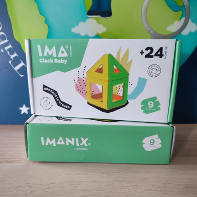 Brinquedo magnético IMANIX e IMAN Clack Baby em caixas verdes com 9 peças cada.
