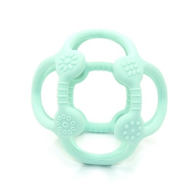 Brinquedo de dentição azul claro em forma de flor com texturas variadas