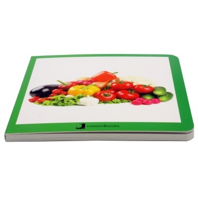 Livro infantil com capa mostrando vários vegetais coloridos