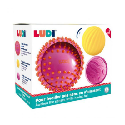 Caixa de brinquedo LUDI com três bolas sensoriais coloridas em relevo