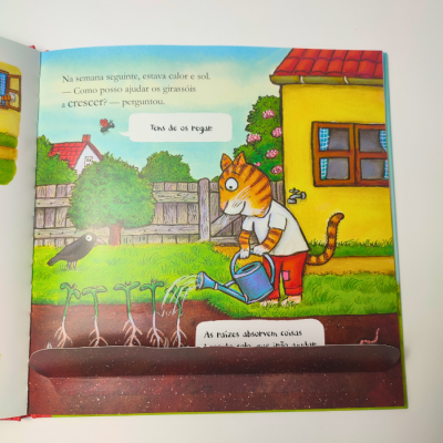 Ilustração de gato a regar plantas num livro infantil com texto em português