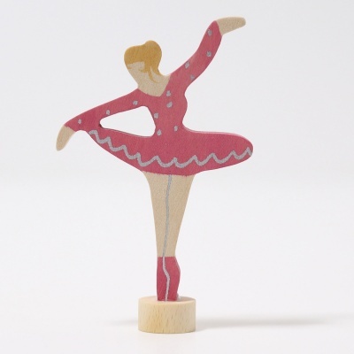 Figura de bailarina em madeira cor-de-rosa com base redonda