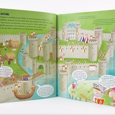 Livro infantil aberto com ilustração de castelo medieval e texto em português.