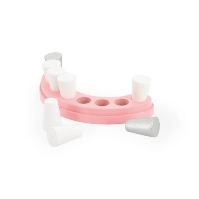Simulação de dentes brancos e cinzento em base rosa semicircular
