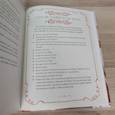 Página de livro aberto com texto em português sobre lembretes de Natal e número de página 159