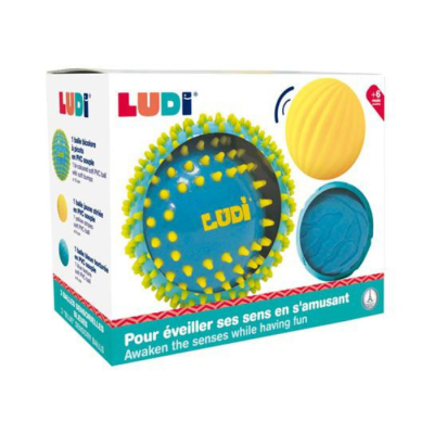 Embalagem do produto LUDI com bolas sensoriais azul e amarela para bebés.