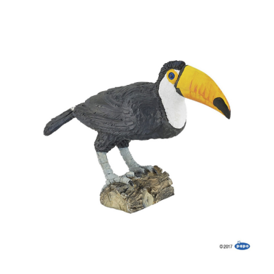 Figura decorativa de tucano com bico amarelo e corpo preto e branco