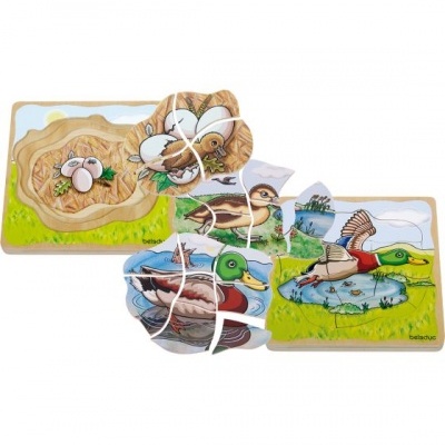 Puzzle infantil de madeira com imagens de ovo e pato em vários estágios