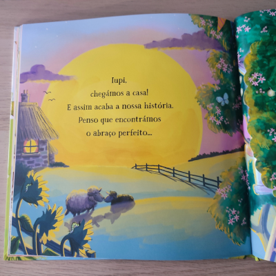 Página de livro ilustrado com texto e cenário campestre ao pôr do sol.