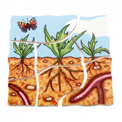 Puzzle ilustrativo de planta e minhocas na terra com uma borboleta no céu