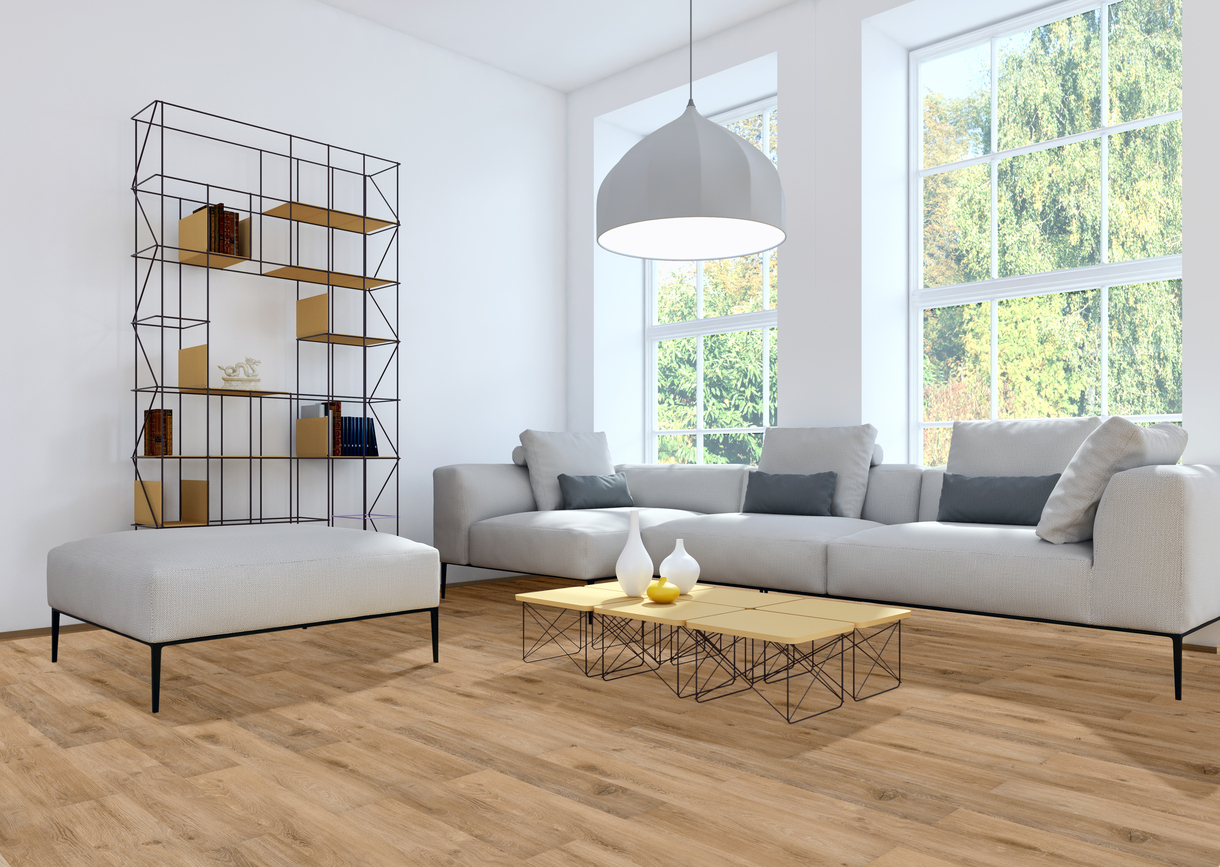 GRIT 1523 FELICA — Pavimento LVT & SPC Série VIVA Modern living room with gray sofa and ottoman, yellow and black coffee table, metal shelving unit, wooden floor, large windows, and white pendant lamp