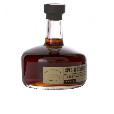 Garrafa de vidro com licor castanho e rótulo SPECIAL RESERVE TAWNY PORT