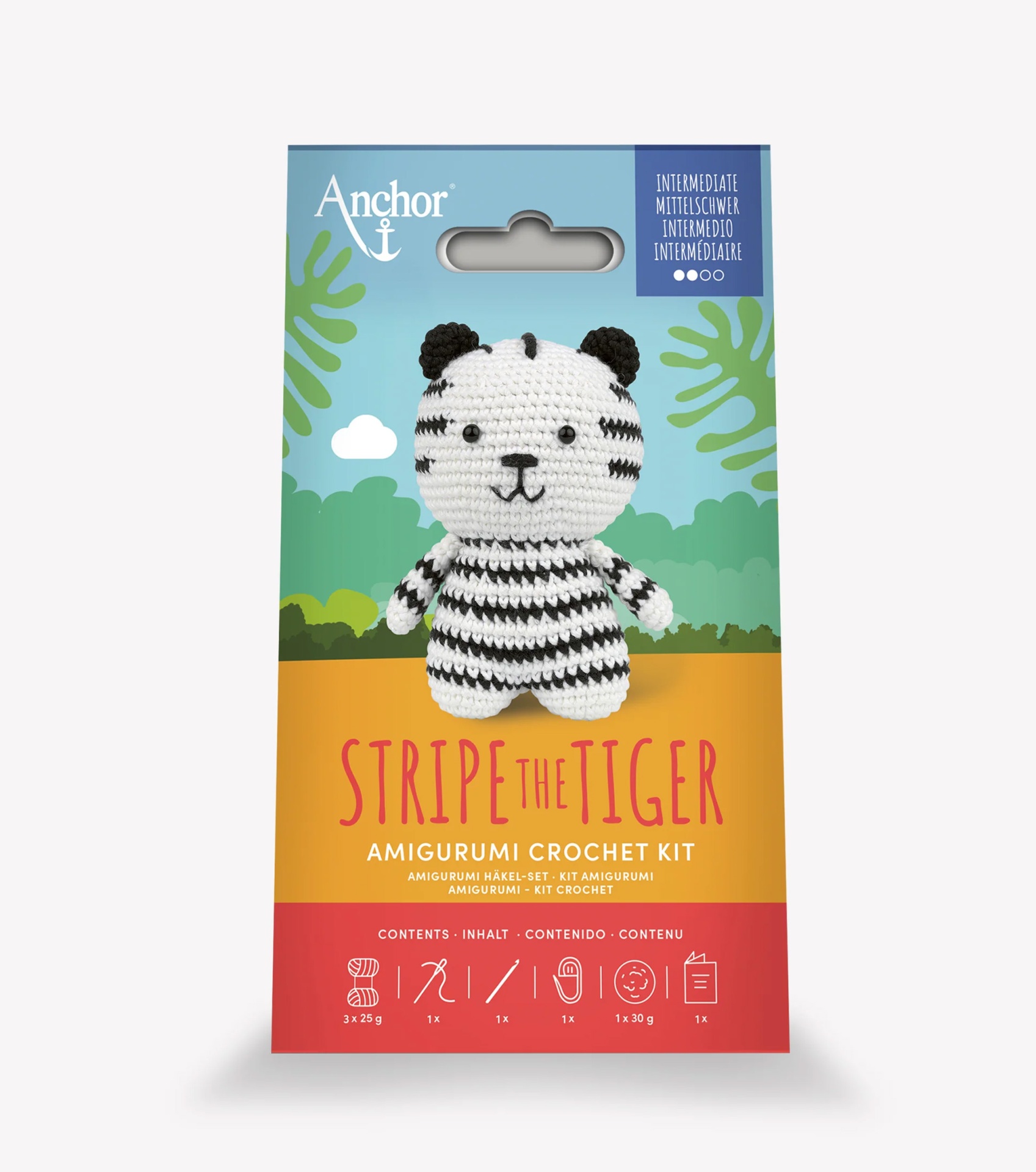 Kit de crochet com tigre amigurumi em branco e preto com embalagem colorida