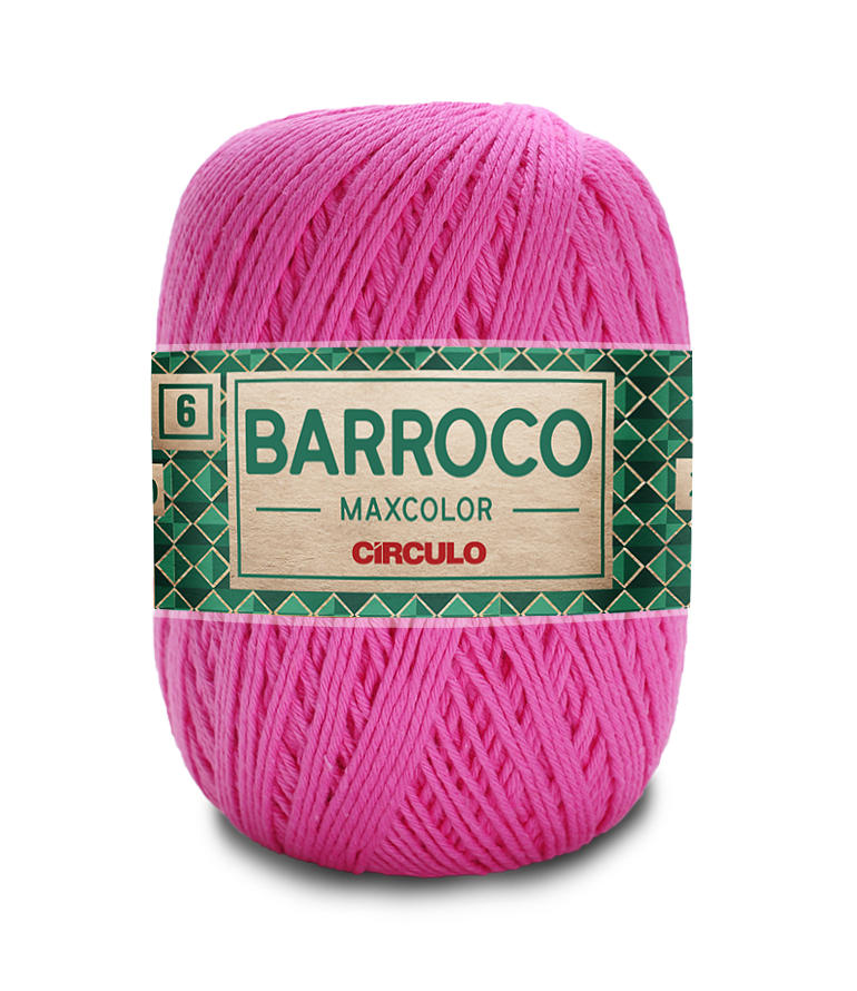 Novelo de fio rosa com etiqueta verde e dourada