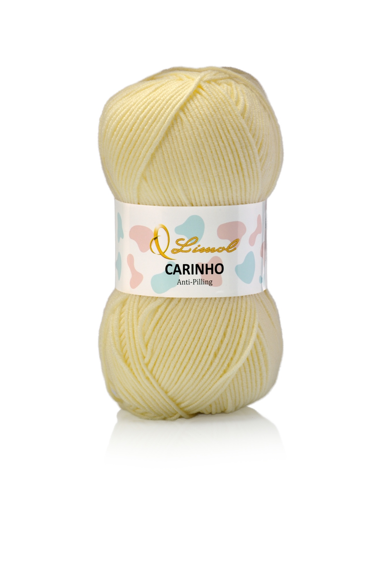 Novelo de lã amarelo claro com rótulo branco