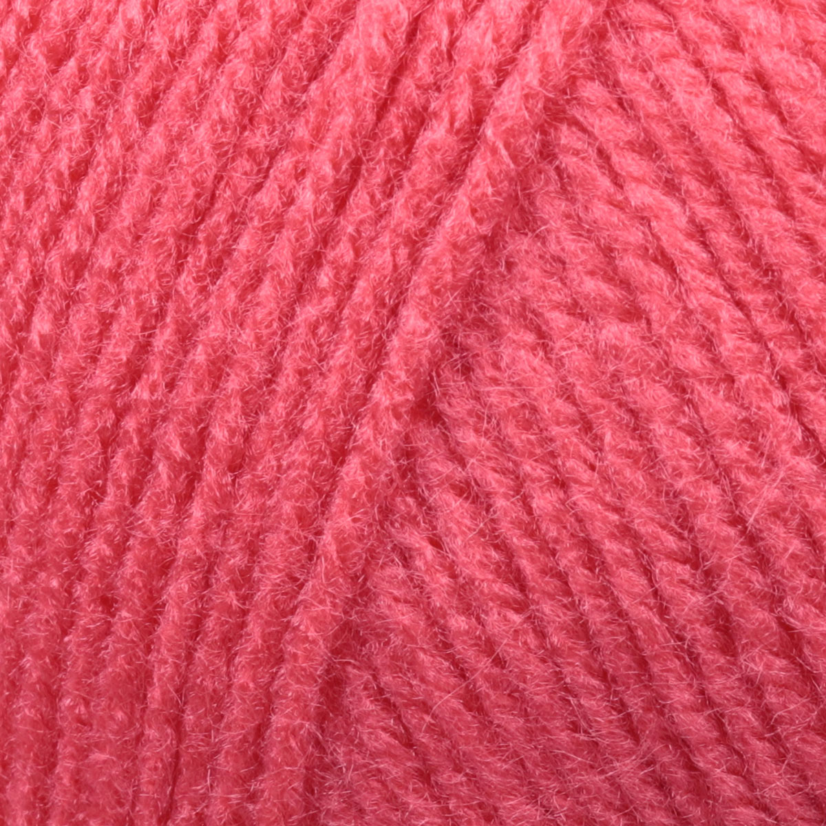 Close-up de novelo de lã rosa