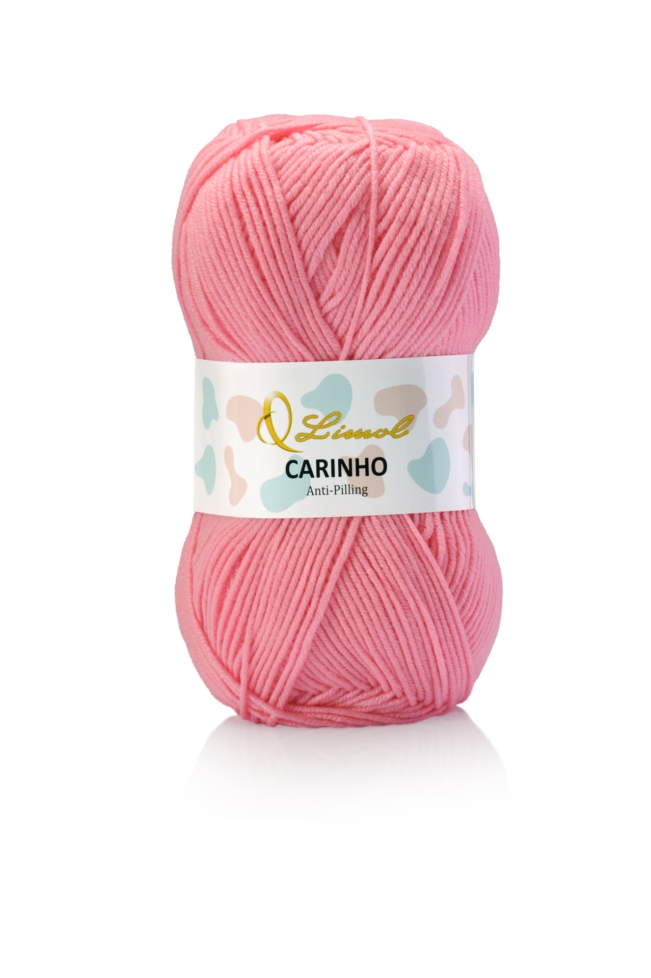 Novelo de lã rosa com etiqueta branca e texto