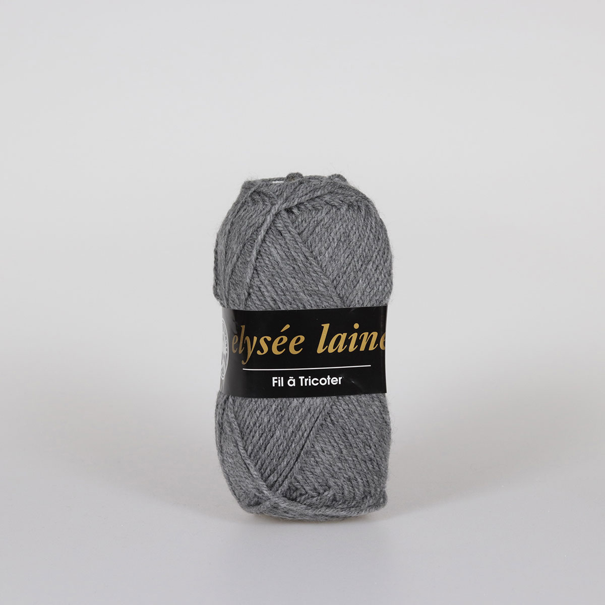 Novelo de lã cinzenta Elysée Laine com etiqueta preta e texto