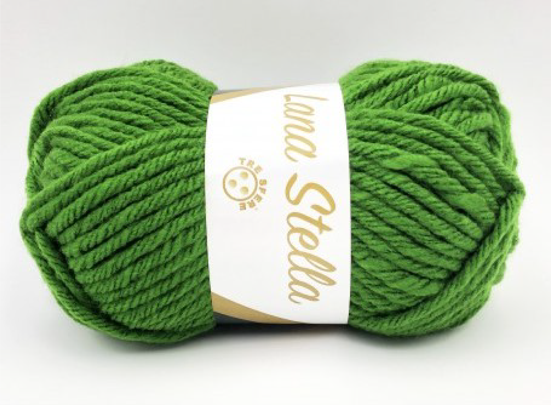 Novelo de lã verde com etiqueta branca 'Lana Stella'