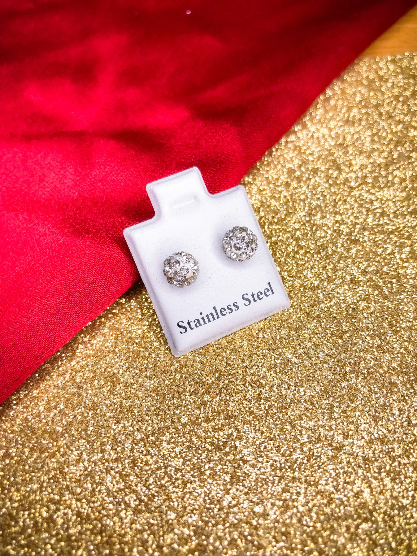 Brincos redondos em aço inoxidável com pedras brilhantes
